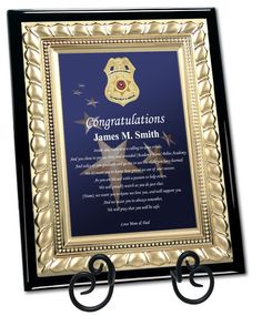 an award plaque is displayed on a black and gold frame with the words congratulations to james m smith