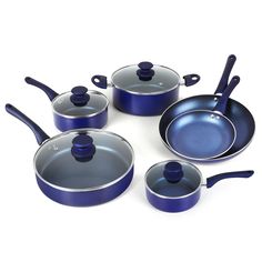 blue pots and pans on a white surface