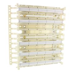 the back side of a wall mounted rack with multiple rows of white plastic parts on it