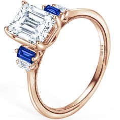 Elegance knows no bounds with this timeless five-stone engagement ring from Kirk Kara's beloved Stella collection. Adorned with two enchanting blue sapphire emerald cut side stones and two baguette cut diamonds, it's a tribute to enduring beauty and grace. Their signature handcrafted touches, including delicate milgrain and intricate signature filigree, elevate this piece to a level of artistry that's truly exceptional. While the main image showcases a stunning 1.25 carat radiant cut stone, don' Blue Sapphire Engagement Ring, Jewelry Appraisal, Sapphire Engagement Ring Blue, Sapphire Engagement Ring, Baguette Cut Diamond, Stone Engagement Rings, Stone Engagement, Radiant Cut, Sapphire Engagement