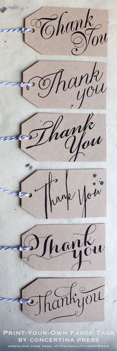 four handwritten thank you tags are lined up on a sheet of paper with twine