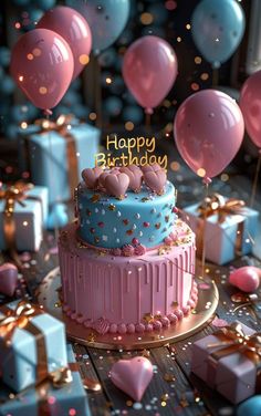 a pink and blue birthday cake surrounded by balloons