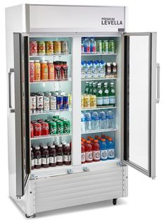 an open refrigerator with drinks and sodas on the doors, isolated against a white background