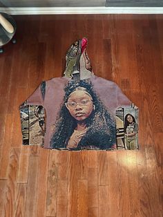 a woman's face is shown on the floor next to a pair of shoes