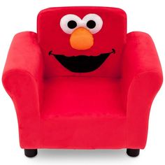 a red children's chair with an angry bird face on the arm and legs