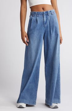 Make a statement in these pleated, vintage-inspired jeans fashioned with trouser-style pockets and superwide legs that sway with every step. 32" inseam; 30" leg opening; 11 1/2" front rise; 15 1/2" back rise Zip fly with button closure Side slant pockets 63% cotton, 27% polyester, 8% rayon, 2% spandex Machine wash, tumble dry Imported Super Wide Leg Jeans, Pleated Jeans, Outfit Vintage, Dream Style, Trendy Chic, Trouser Style, Denim Trousers, Jeans Style, Wide Leg Jeans