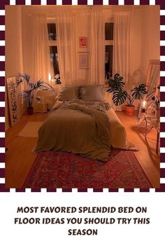 a bed sitting on top of a wooden floor next to a window