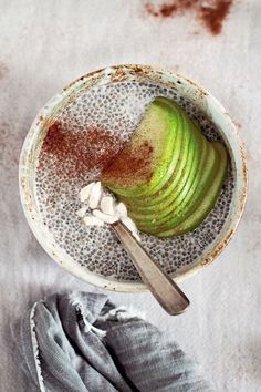 an apple and cinnamon drink in a cup