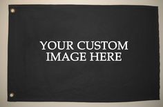 a black and white banner with the words your custom image here on it, hanging from a wall