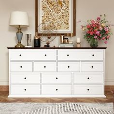 This beautifully crafted piece features a stunning ivory-white finish with a rich brown top, adding a touch of elegance to any room.With its generous dimensions of 31.5 inches in height,61 inches in width, and 15.7 inches in depth, this dresser offers ample storage space to keep your belongings organized and your space clutter-free.The white chest of drawers comes with 12 drawers in 3 sizes for almost kinds of clutter, the drawers are ideal to store clothes, baby toys, books and more items. The Chest Of Drawer, Dresser Chest, Double Dresser, Brown Top, Dresser, Drawers, Living Room, Bedroom, Wood