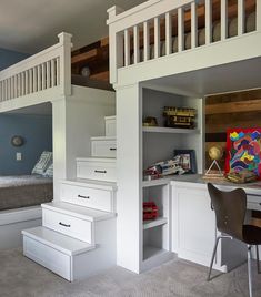 a loft bed with stairs leading up to it