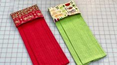 two pairs of red and green socks on a cutting board