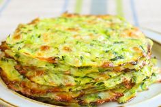 a stack of zucchini fritters on a plate