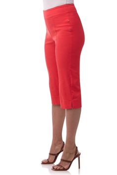 Show off your original style with these capris. The front seam details are not only chic, they also create a slimming effect so you can go about your day feeling confident and stylish and the touch of bling from the small rivets don't hurt either! With easy pull-on styling, you can spend less time fumbling with zippers and closures while remaining comfortable all day long. These capris are great for styling just the way you want so you can feel fabulous while tackling that to do list.Mid-rise st Elegant Stretch Capris For Summer, Elegant Stretch Summer Capris, Elegant Knee-length Spring Shorts, Spring Bermuda Stretch Pants, Elegant Stretch Capri Bottoms, Elegant Stretch Capris, Chic Summer Capris, Elegant Fitted Capri Length Bottoms, Elegant Stretch Cropped Leg Capris