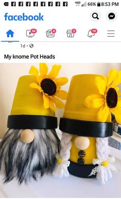 two yellow hats with flowers on them are sitting next to each other in front of a facebook page