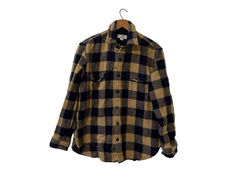 "*damaged Vintage Navy & Khaki Brown Bufflao Plaid Thick Flannel Wool Blend Shacket Longsleeve Blue and Tan Button Down CPO with Pockets Men's Medium ☆ SIZE:   Measurements fit a Men's Medium ☆ MEASUREMENTS (inches, item lying flat): ✄ Length: 26\" ✄ Width (armpit to armpit): 20 1/2\" ✄ Arms (armpit seam to cuff): 17\" ☆ COLOR: Blue and Tan ☆ MATERIAL: 85% Wool,  15% Nylon ☆ BRAND: Wallace and Barnes  ☆ CONDITION:  The item is vintage and previously loved.  There are several repaired spotss on t Fall Workwear Flannel Shirt With Snap Buttons, Fall Flannel Work Shirt With Snap Buttons, Fall Flannel Shirt With Snap Buttons For Work, Vintage Flannel Workwear Shirt For Fall, Vintage Flannel Shirt For Fall Workwear, Vintage Fall Workwear Flannel Shirt, Vintage Long Sleeve Flannel Shirt For Work, Vintage Blue Flannel Shirt For Fall, Navy And Khaki