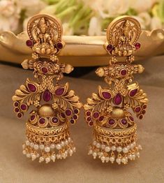 Present Beautiful Gold Earrings with Floral Design  Traditional Indian Jhumkas Gold Jhumka Earrings Gold Ear Rings Designs Latest Buttalu, Gold Jhumki Latest Design, Gold Earrings Butalu, Jumkas Gold Indian Bridal Latest, Gold Earrings Latest Designs, Jhumka Designs Antiques, Jumka Earrings Gold Indian Jewelry, Ear Rings Gold Indian Bridal, Gold Buttalu Earrings Latest Heavy