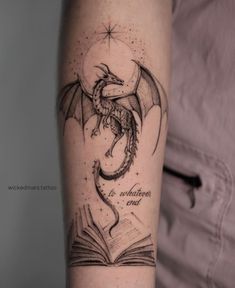 dragon tattoo Dragon Tattoo Forearm Wrap, Fine Line Dragon Tattoo Back, Wyvern Tattoo For Women, Dragon Memorial Tattoo, Fairytale Dragon Tattoo, Dragon Holding Orb Tattoo, Dragon On Arm Tattoo, Book And Dragon Tattoo, Book Dragon Tattoo Ideas