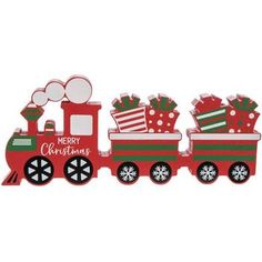 a red and green christmas train with presents on the front, sitting next to each other