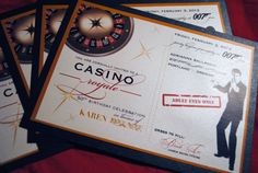 three different types of casino cards on top of each other, one with a man in a tuxedo and the other with a clock