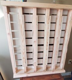 a wooden shelf with some bookshelves built into it