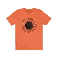 Sunflower Shirt,Sunflower Shirts For Women,Botanical T shirt,Sunflower tee, Flower Shirt ,Boho tee,Sunflower Shirts,Sunflower Graphic Tee,Plus size tee.Retail fit. (Runs true to size) . Please refer to size chart in photos. Recommend laying your current favorite tee flat and measuring it for a comparison.SHIRT STYLE:Bella+Canvas Unisex T-shirt.99%-100% Combed ring-spun cotton (varies with color).Made by specially treating the cotton fibers before spinning them into yarn. The result is stronger a Willie Nelson Shirt, Sunflower Graphic, Boho Tees, Sunflower Shirt, Plus Size Tees, Fall Tee, Usa Shirt, American Flag Shirt, Bear Shirt