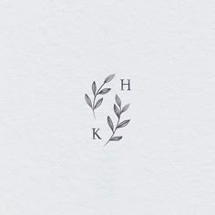 the letter k is made up of leaves and letters that spell it's initials