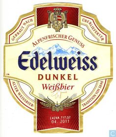 the label for an alcoholic beverage called edelweiss is shown in gold and red