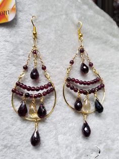 Elegant garnet and citrine dangling earrings.  Three inch total length. Citrine Earrings, Wire Earrings, Citrine, Garnet, Jewelry Earrings Dangle, Beaded Jewelry, Etsy Earrings, Dangle Drop Earrings, Dangle Earrings