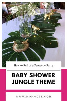 a baby shower jungle theme is featured on the table