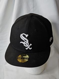 Chicago White Sox New Era 59Fifty Fitted 7 3/8 Hat Baseball On-Field Cap Black Flat Brim Fitted Hat For Baseball Season, Sports Flat Cap For Baseball Season, Sporty Fitted Hat With Flat Brim For Baseball Season, Sporty Flat Brim Fitted Hat For Baseball Season, Classic Flat Brim Fitted Hat For Baseball Season, Black Snapback Hat For Baseball Season, Black Snapback Hat, One Size Fits Most, Fitted Black Snapback Hat, White Sox Hat