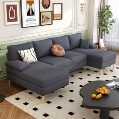 a living room scene with focus on the couch and coffee table in the foreground