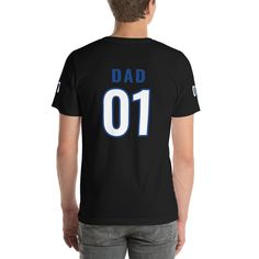 "This t-shirt is everything you've dreamed of and more. It feels soft and lightweight, with the right amount of stretch. Great for sports lover dads, the jersey-like shirt features the number \"01\" and the title \"dad\" on the front and back. As an added detail, number 01 insignia is printed on both sleeves. Makes a wonderful Father's Day,  birthday or just because gift for best dads, new dads and all dads! * 100% combed and ring-spun cotton (Heather colors contain polyester) * Athletic and Bla Casual Sports T-shirt For Father's Day, Father's Day Team Spirit Crew Neck T-shirt, Father's Day Team Spirit T-shirt With Crew Neck, Father's Day Sports Fan T-shirt With Letter Print, Cotton Tops For Father's Day Sports Events, Cotton Tops For Sports Events On Father's Day, Father's Day Fan Apparel T-shirt With Team Name, Father's Day Game Day Fan Apparel T-shirt, Sports T-shirt With Text Print For Father's Day