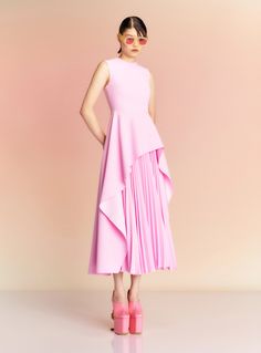 The Severny Midi Dress in Blush – Solace London US Pink Midi-length Pleated Dress, Chic Pink Midi-length Pleated Dress, Luxury One-shoulder Asymmetrical Pleated Dress, Pink Pleated Voluminous Skirt, Luxury Pre-draped Pink Midi Dress, Modern Cocktail, Solace London, Pleated Skirt, Bridal Dresses