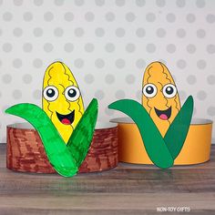 two corn on the cob paper craft for kids, one with eyes and mouth