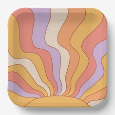 a paper plate with an abstract design on the front and sides, in pastel colors