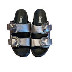 Cougar Pepa Platform Sandal Silver Metallic Nwot Size 8 Go Bold By Centering Looks Around The Pepa Platform Sandals From Cougar. Set On A Platform Sole With Aggressive Sawtooth Treads, This Open-Toe Sandal Features Slide Straps With Modern, Tonal Buckles That Coordinate With The Upper. Featuring: Water-Repellent & Stain-Resistant Leather Upper Slip-On Round Open Toe Leather Lining & Footbed 1½" Platform Heel Silver Round Toe Slides With Buckle Closure, Silver Sandals With Buckle Closure For Summer, Silver Footbed Sandals With Round Toe For Summer, Silver Open Toe Footbed Sandals With Buckle Closure, Silver Footbed Sandals For Summer, Silver Footbed Sandals For Spring, Silver Flat Platform Sandals, Silver Round Toe Sandals For Summer, Silver Round Toe Summer Sandals