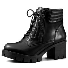 a pair of black boots with zippers on them