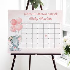 a calendar with an elephant and balloons on it for baby charlotte's arrival party