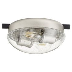 a close up of a light fixture on a white background