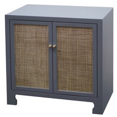 a gray cabinet with two doors and wicker panels