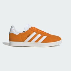 adidas Shop the Gazelle Shoes - Orange at adidas.com/us! See all the styles and colors of Gazelle Shoes - Orange at the official adidas online shop. Orange Gazelle, Orange Adidas Sneakers For Light Sports, Pink And Orange Gazelle, Adidas Gazelle Orange, Colorful Gazelle Adidas, Adidas Orange Sports Sneakers, Adidas Gazelle Shoes, Gazelle Shoes, Adidas Orange