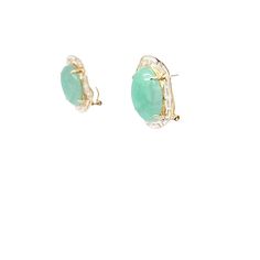 These earrings are crafted in 14 Karat yellow gold and feature two 14mm x 10mm cabochon oval Jade. Surrounding the center stones there is a unique gold border and these earrings have pierced posts with omega clip backs. These earrings measure 0.75 inches long. Jade Earrings, Gold Border, Jade, Gems, Yellow Gold, Stone, Yellow, Gold