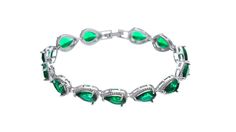 Discover the elegance and allure of the Silver Emerald Green Teardrop Bracelet. Add sophistication to any outfit with its stunning design. Formal Silver Teardrop Bracelets, Elegant Green Crystal Bracelets, Elegant Green Crystal Bracelet For Formal Occasions, Formal Cubic Zirconia Teardrop Bracelets, Formal Teardrop Cubic Zirconia Bracelet, Elegant Pear-shaped Silver Bracelet, Green Cubic Zirconia Crystal Bracelet, Elegant Green Tennis Bracelet For Party, Emerald Green