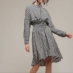 Notched Collar Dress With Frills, In Black And White Gingham. 100% Viscose. Brand New With Tags Spring Plaid Midi Dress Knee-length, Casual Gingham Dress With Ruched Details, Fall Gingham Plaid Midi Dress, Casual Ruched Gingham Dress, Casual Gingham Midi Dress With Ruffles, Fall Plaid Midi Dress, Gingham Plaid Knee-length Dress With Ruffles, Elegant Gingham Plaid Midi Dress, Chic Gingham Midi Dress With Ruffles