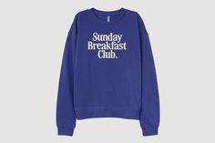 a sweatshirt with the words sunday breakfast club printed on it