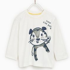 - 100% Cotton - Machine Wash Long Sleeve T-shirt With Character Print For Playtime, Spring Long Sleeve T-shirt With Character Print, White Crew Neck T-shirt For Playtime, Playful Tops With Funny Print For Playtime, Cotton Long Sleeve T-shirt With Character Print, Summer Long Sleeve T-shirt With Character Print, Funny Print Tops For Spring Playtime, Zara Playful Cartoon Print T-shirt, Long Sleeve Cotton T-shirt With Cartoon Print