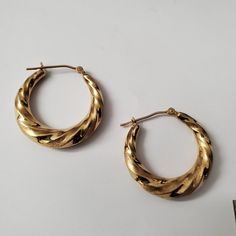 Metal: 14k Solid Gold. Style: Earrings. Color: Yellow Gold. Size: See Pictures. Description: The Listing Shows A Pair Of 14k Gold Hoop Earrings With A Twisted Design. The Hoops Have A Bold, Rounded Shape With A Polished Finish That Gives Them A Shiny And Luxurious Appearance. The Twisting Pattern Adds A Dynamic And Stylish Element, Making Them Stand Out From Typical Hoop Earrings. These Earrings Are Both Elegant And Versatile, Suitable For Both Casual Wear And More Formal Occasions, Providing A 14k Hoop Earrings For Anniversary, Formal Hoop Earrings Hallmarked, Formal Hallmarked Hoop Earrings, 14k Stamped Hoop Earrings For Anniversary, 14k Yellow Gold Huggie Hoop Earrings, Formal 14k Stamped Fine Hoop Earrings, Yellow Gold 14k Huggie Hoop Earrings, Anniversary 14k Stamped Fine Hoop Earrings, Hoop Earrings In 14k Gold