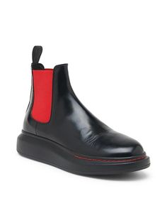 The McQueen Chelsea Platform Boot - a standout staple reimagined. Italian leather, rounded toe and vibrant elastic panels update this iconic style with an elevated lift, perfect for rocking any look with signature edge and comfort. #McQueenBoots High-top Leather Chelsea Boots With Contrast Sole, High-top Chelsea Boots With Contrast Sole, Chelsea Boots With Contrast Sole And Calf Leather, Calf Leather Chelsea Boots With Contrast Sole, Modern Boots With Red Sole And Round Toe, High-top Leather Platform Boots With Rubber Heel Cap, Leather Chelsea Boots With Platform, Leather High-top Platform Boots With Rubber Heel Cap, Leather Platform Boots With Red Sole For Fall