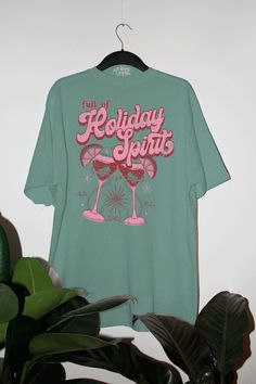 Get full of holiday spirit in our festive Christmas cocktail oversized tshirt- Features two cocktails with the phrase "full of Holiday Spirit" above it all in a pink and red ink- Screen print transfer that is individually heat pressed onto each sweatshirt- High quality vintage wash tshirt that gets softer with every wash- Oversized fit - 100% Cotton - Sizing translation: XS/S : L, S/M : XL , L/XL : 2XL , 2XL/3XL : 3XL Pink Graphic Print T-shirt For Holiday, Pink Holiday Top With Graphic Print, Pink Graphic Print Top For Holiday, Holiday Graphic Print Relaxed Fit Tops, Holiday Graphic Print Tops With Relaxed Fit, Holiday Tops With Graphic Print In Relaxed Fit, Pink Letter Print T-shirt For Holiday, Cocktail Tshirt, Christmas Cocktail